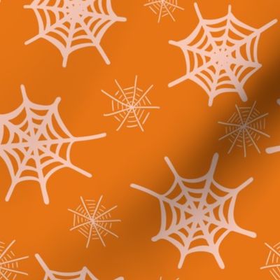 Scattered spiderwebs  -  pastel peach and terracotta orange  //  Medium scale