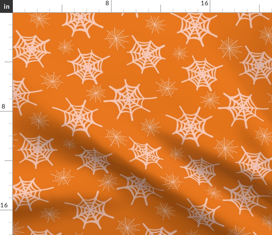 Scattered spiderwebs  -  pastel peach and terracotta orange  //  Medium scale