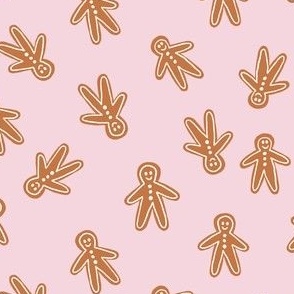 dark gingerbread men on pink floss - kitschy christmas