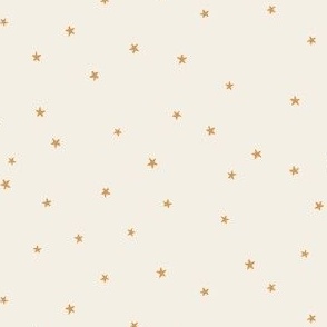 Tiny festive twinkle stars in gold