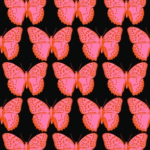 medium spotted butterflies pink and poppy red on black