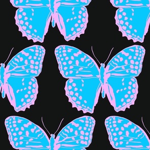 large spotted butterflies sky blue and pastel pink on black