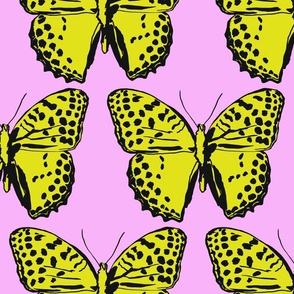 large spotted butterflies lime and black on pastel pink