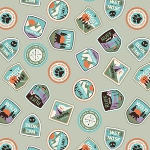 Dog adventures - tossed vintage springtime camping stickers and mountain badges with wet noses muddy paws and summer camp nature patches retro teal blue green orange on sage green