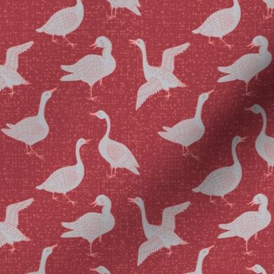 Small Scale Lake life of Geese. Light grey on dark red, textured background