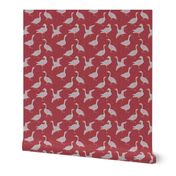 Small Scale Lake life of Geese. Light grey on dark red, textured background