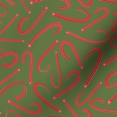 Holiday candy canes on lime