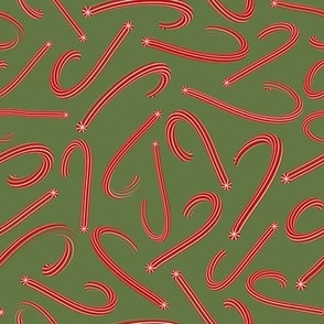Holiday candy canes on lime