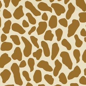 Large scale traditional and modern animal print in russet brown and Beige.