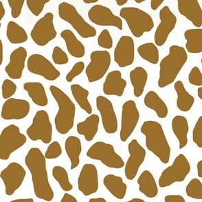 Large scale traditional and modern animal print in russet brown and white.