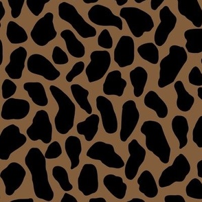 Large scale traditional and modern animal print in dark onyx black and burnt umber.
