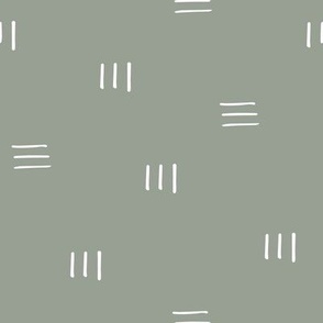Minimal mud cloth horizontal and vertical dashes in cream on sage green