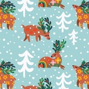Christmas deers on blue