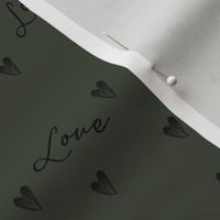 black freehand hearts on offshore green