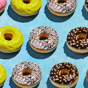 Donuts with white, yellow and brown glaze