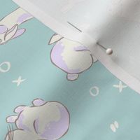 Easter Bunny kisses - white rabbits and xoxo with purple on mint green by Jac Slade