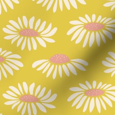 Daisy petals on yellow