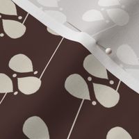 Cream Droplets Shapes on Molasses Brown Background 