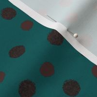 Chocolate dots on teal dark background