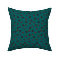 Chocolate dots on teal dark background