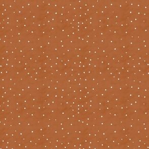 White dots on tan gingerbread with light texture