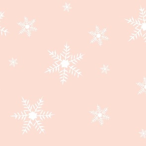 snowflakes on peach fuzz fabric_pastel holiday