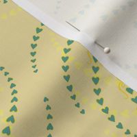 Pastel goth style pattern with calligraphy hearts fern leaves in yellows and green “Black heart”