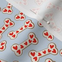 Valentine's Day dog bone cookies and hearts on blue 4.5
