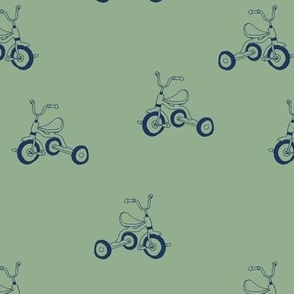 Vintage iconic toys - kids tricycle cute retro seventies style bike navy blue on olive green