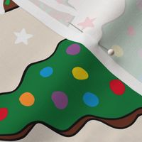 Assorted Christmas Tree Cakes Beige Background Rotated - Large Scale