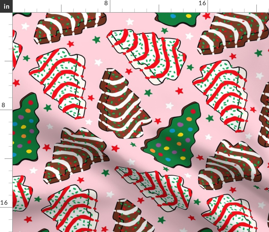 Assorted Christmas Tree Cakes Pink Background - Large Scale