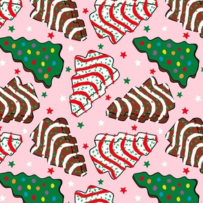 Assorted Christmas Tree Cakes Pink Background Rotated - Large Scale