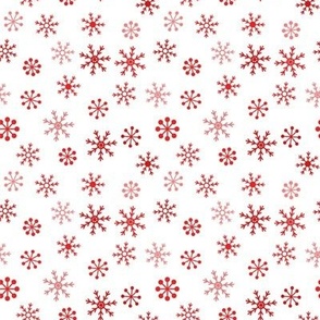 red snowflakes on white