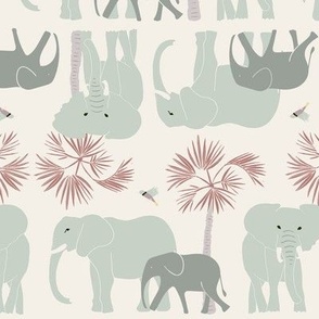 Small herd of elephants with lala palm trees and sunbirds