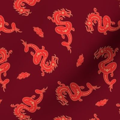 Chinese new year theme - year of the dragon with puffy clouds tossed red yellow on burgundy