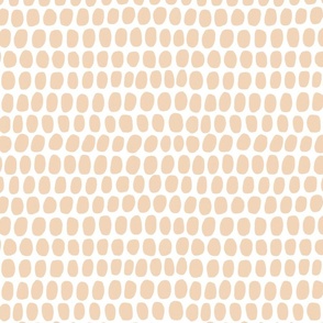Abstract subtle beige brushed dots on white