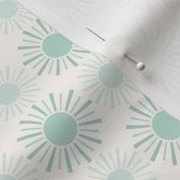Teal Blue Suns on an Off White Background