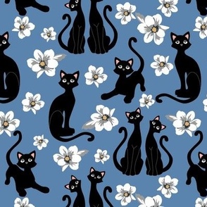 Retro Black Cats and white magnolia flowers on blue denim background