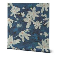 Large scale white star magnolia flowers on an indigo marbled background