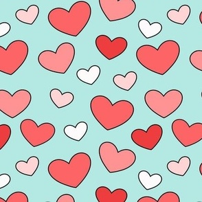 red and pink hearts on teal