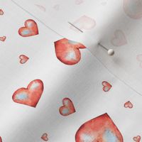 Cute red hearts on white
