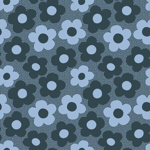 Small scale / Graphic Daisy Hippy Flowers / In Pantone blues, navy and blue on a navy ground that has a dashed line in a lighter blue as a texture.