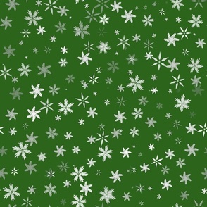 Snowflakes on green background II