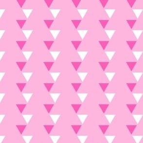 Off kilter dark pink and white small triangles against medium pink background