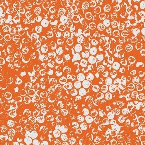 Light grey bubbles on a deep orange background - medium