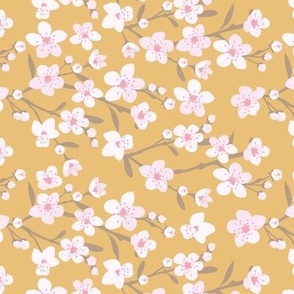 Romantic cherry blossom - springtime in Japan flowers and branches white pink on golden yellow ochre 