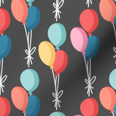 birthday balloons on dark gray