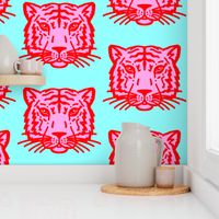 Pink tiger faces on aqua, large scale