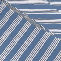 Vertical Imperfect Pinstripe Wallpaper in Denim Blue and White
