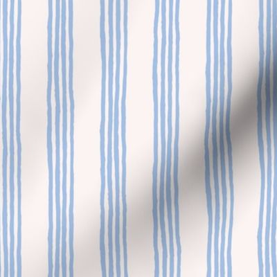Vertical Imperfect Pinstripe Wallpaper in Sky Blue and White